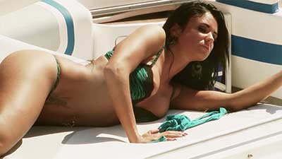 Ashley bulgari takes the sun at her yacht title